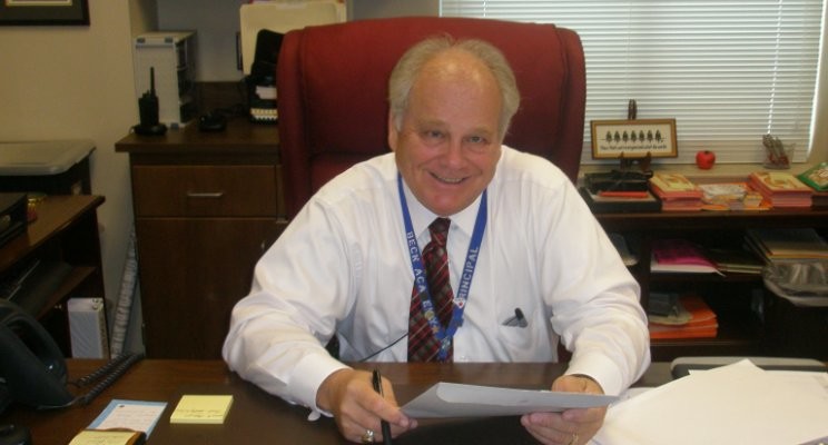 Dr. Brodie Bricker, Principal